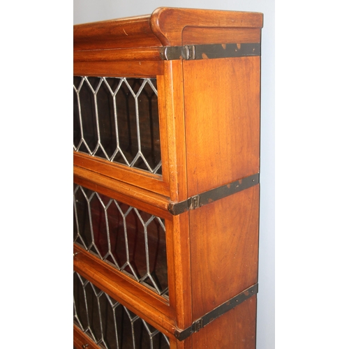 146 - An early 20th century mahogany Globe Wernicke style bookcase with leaded glass panels, 5 tiers with ... 