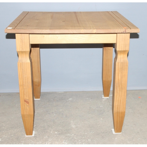 38 - A small modern pine square dining table, approx 80cm wide x 80cm deep x 76cm tall