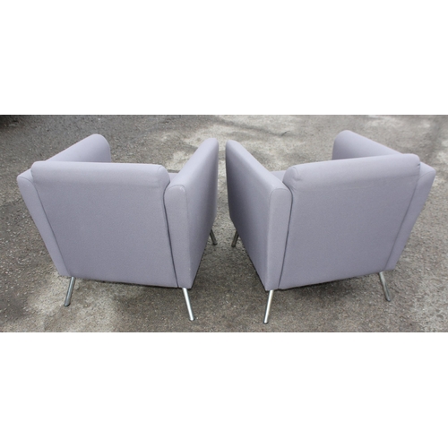 92 - A pair of modern grey covered armchairs with chrome legs, each approx 70cm wide x 73cm deep x 79cm t... 