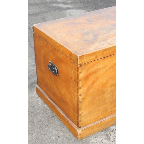 2 - A large antique light Mahogany trunk or silver chest with baize lined interior and iron handles, app... 