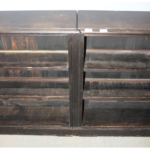 65 - A long low 19th century stained pine bookcase in 2 sections, approx 239cm wide x 27cm deep x 100cm t... 