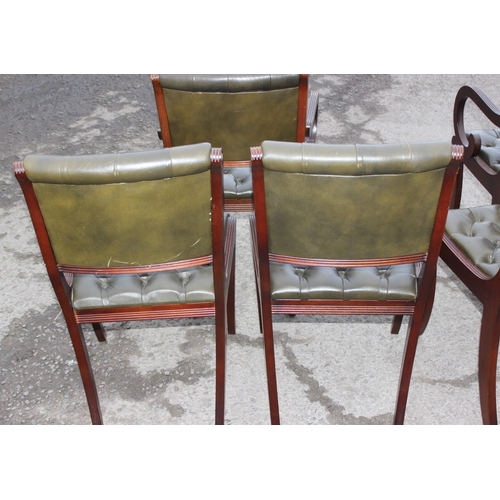 52 - A set of 6 (4+2) mahogany and green Chesterfield button backed leather dining chairs
