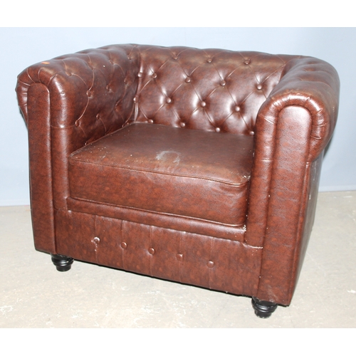 90 - An antique style Chesterfield buttonback club or tub chair, brown faux leather, approx 100cm wide x ... 