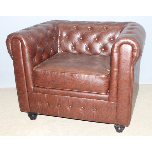 87 - An antique style Chesterfield buttonback club or tub chair, brown faux leather, approx 100cm wide x ... 