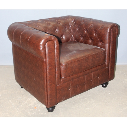89 - An antique style Chesterfield buttonback club or tub chair, brown faux leather, approx 100cm wide x ... 