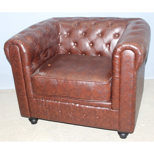 88 - An antique style Chesterfield buttonback club or tub chair, brown faux leather, approx 100cm wide x ... 