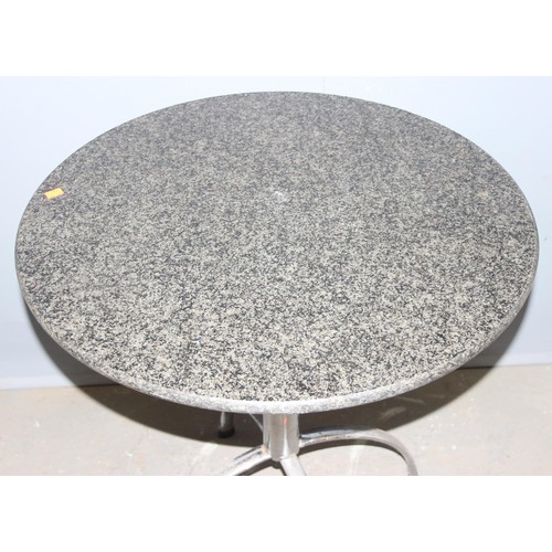 109 - A round grey marble topped table with chrome base, Space Age style, approx 70cm round x 77cm tall