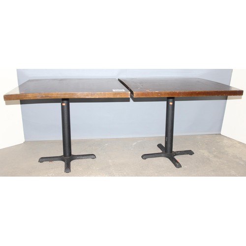 101 - A pair of metal base and square topped café or restaurant tables, each approx 90cm square x 73cm tal... 