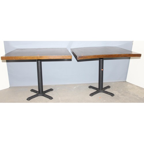 97 - A pair of metal base and square topped café or restaurant tables, each approx 90cm square x 73cm tal... 