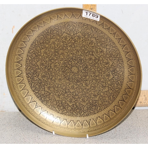 1789A - A good quality Indian or Islamic brass bowl with engraved decoration, approx 30cm in diameter