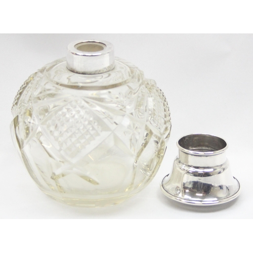 1049 - An antique grenade shaped perfume bottle with silver top and cut glass body, Birmingham 1920, makers... 