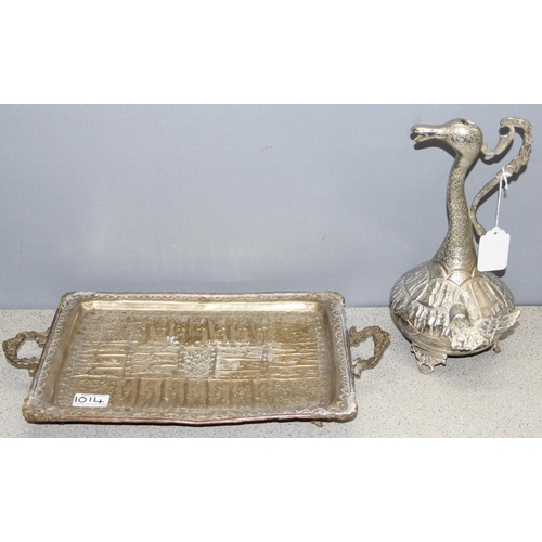 1014 - 2 Middle Eastern white metal items consisting of a long necked bird wine ewer and a rectangular heav... 