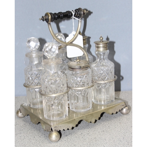 1023 - Antique silver-plated cruet set with cut glass bottles and a silver-plated serving dish/tureen with ... 