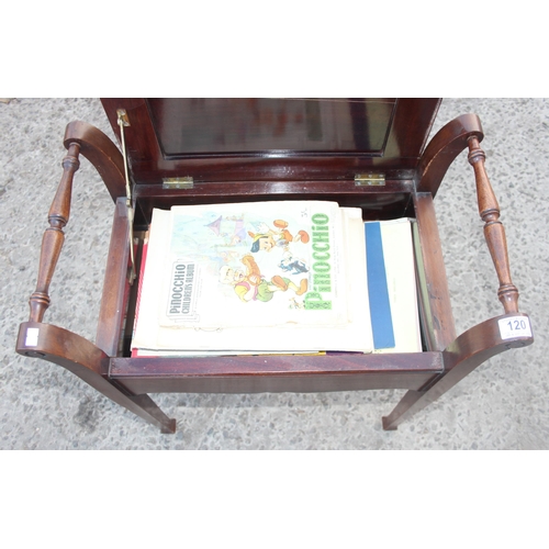 120 - Antique mahogany piano stool with upholstered seat, containing vintage sheet music