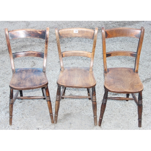 124 - A trio of antique elm seated Oxford chairs