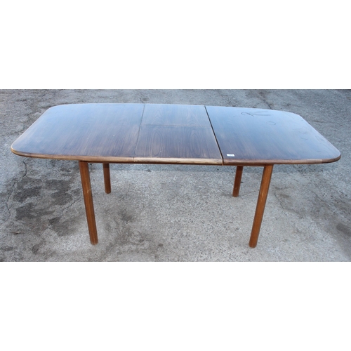 125 - Retro G-Plan extending dining table, approx 189cm/143cm wide x 99cm deep x 74cm tall