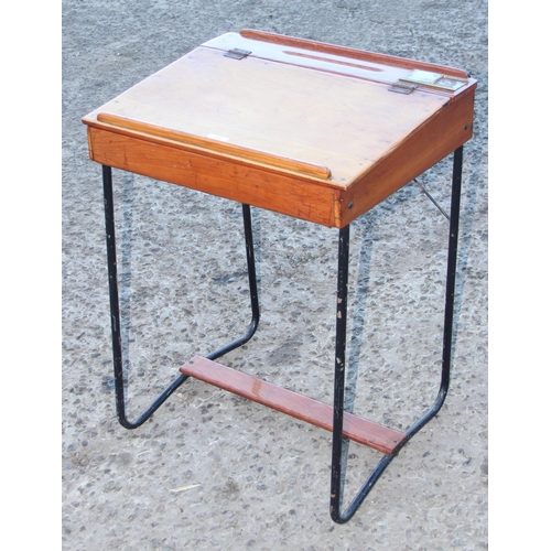 13 - A vintage wooden school desk with iron legs, approx 53cm wide x 43cm deep x 70cm tall