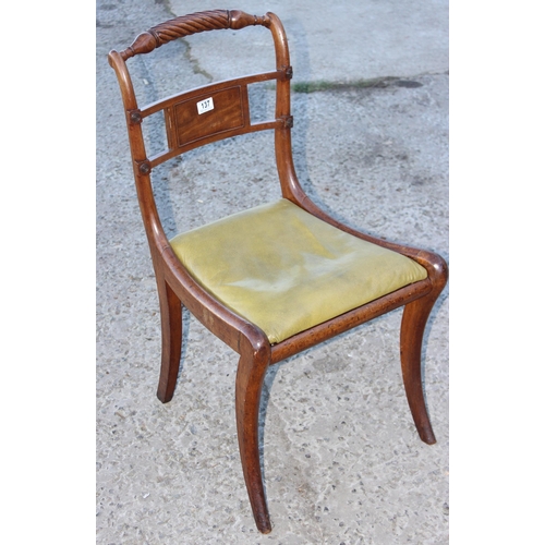 137 - Regency single mahogany desk chair with carved rope back top rail standing on sabre shaped tapering ... 