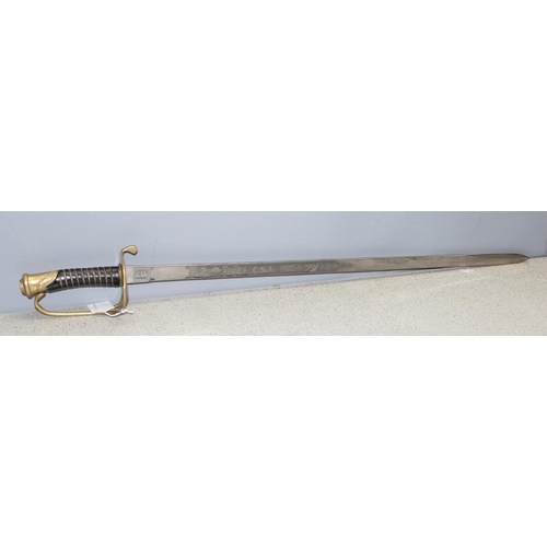 1404 - A reproduction Confederate States of America (CSA) sword with sheath, approx 97cm long