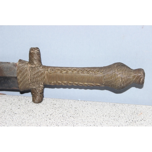 1406 - A vintage Shona Peoples of Zimbabwe Bakatwa style sword with carved wooden sheath and wire wrapped d... 