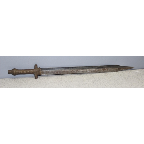 1406 - A vintage Shona Peoples of Zimbabwe Bakatwa style sword with carved wooden sheath and wire wrapped d... 