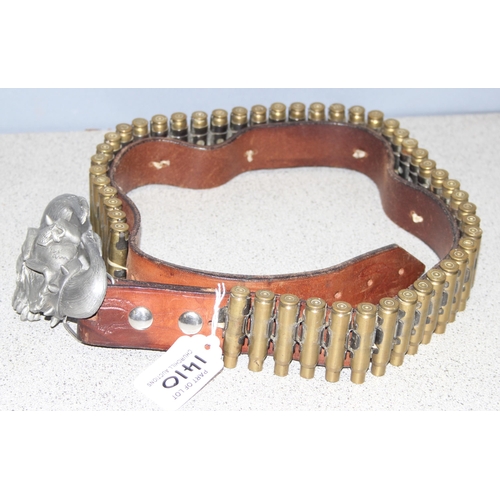 1410 - 3 leather belts with collectable buckles, one with bullet cases