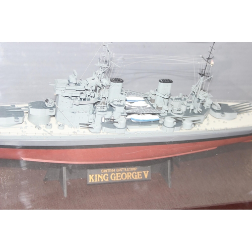 1501 - Model of British Battleship HMS King George V in mounted large Perspex display box, approx 86cm x 33... 