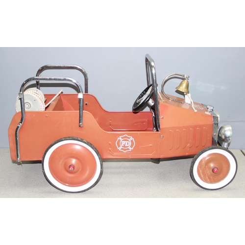 1517 - A vintage style children's pedal truck fire engine, approx 93cm long