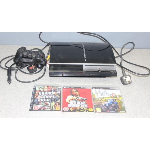 1522 - Sony PlayStation 3 with 3 games incl Grand Theft Auto IV