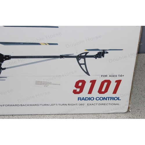 1524 - Large 9101 radio controlled helicopter by Double Horse and one other (small)