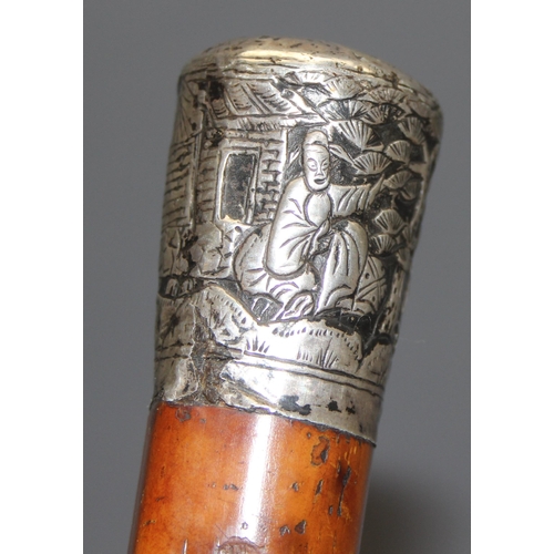 1613 - 2 walking sticks, one with white metal top (XRF tests as approx 85% silver) with Malacca shaft, appr... 