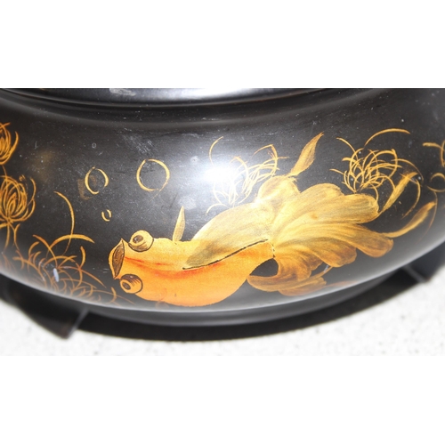 1615 - A small vintage Japanese lacquer bowl decorated with fish, seemingly unmarked, approx 18cm in diamet... 