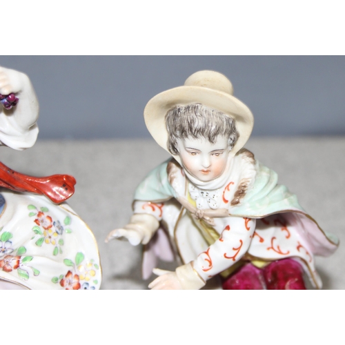 1624 - A pair of early 20th century Rudolstadt of Germany porcelain figures in the manner of Chelsea, beari... 