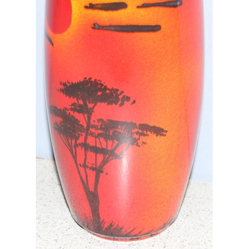 1661 - A Poole pottery Form vase by Andrew Tanner, decorated with a silhouette of a tree beneath a red sun,... 