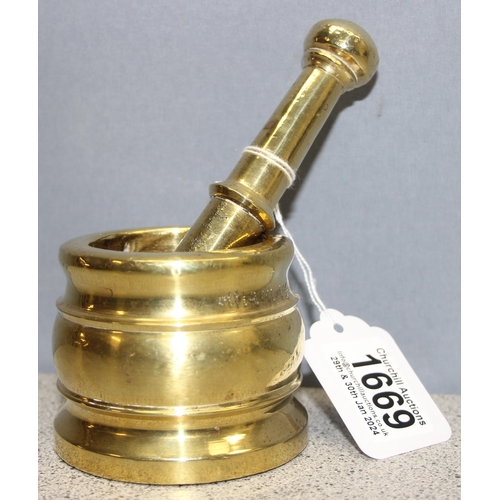 1669 - Small solid brass pestle and mortar with Middle Eastern? inscription, approx 7cm tall (mortar)