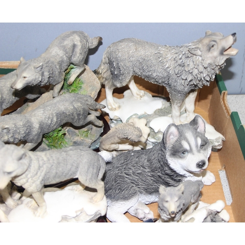 1754 - 2 boxes of collectable wolf themed items