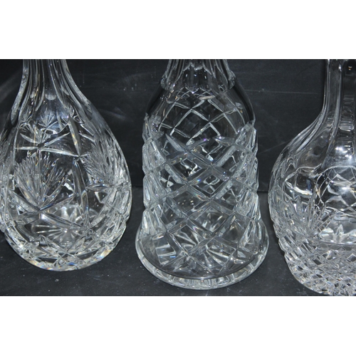 1768 - 4 assorted glass drinks decanters, tallest approx 35cm