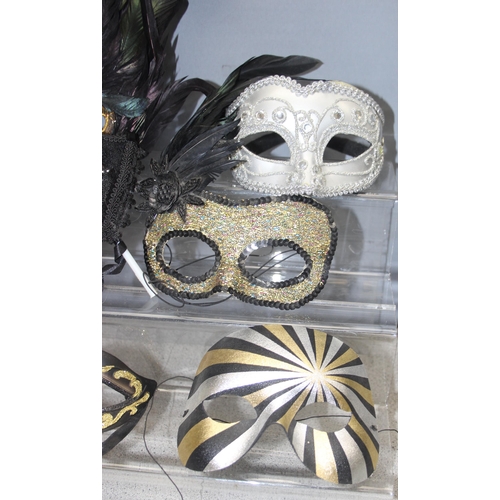 203 - Qty of assorted Masquerade ball masks etc