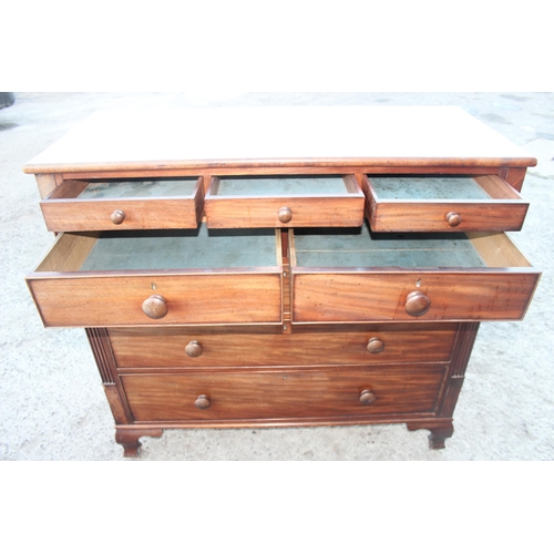 21 - An unusual antique mahogany chest of drawers, the drawers of uncommon form being 3 over 2 over 3, st... 