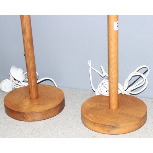 248 - Pair of John Lewis wooden floor standing lamps with long pierced shades, approx 120cm H