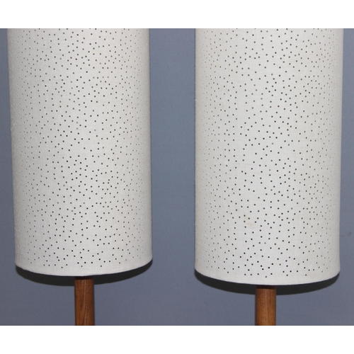 248 - Pair of John Lewis wooden floor standing lamps with long pierced shades, approx 120cm H