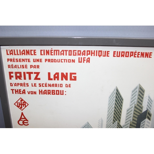 401 - A framed French Metropolis by Fritz Lang film poster, approx 103cm x 73cm inc frame