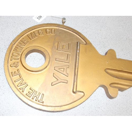 403 - Large cast aluminium Yale shop advertising hanging key sign, approx 78cm long