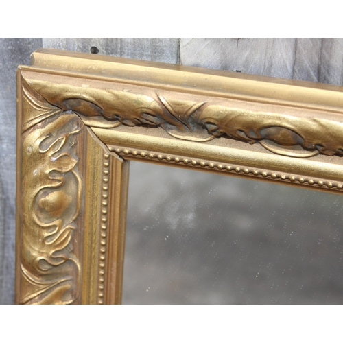 409 - Large gilt-framed mirror, approx 112cm x 86cm