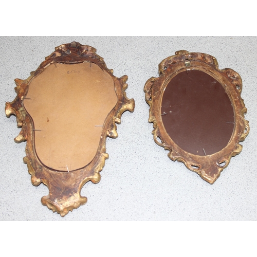 423 - 2 small ornate gilt-framed shaped mirrors, largest 38cm x 24cm