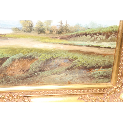 448 - 20th century oil on canvas of a landscape, indistinctly signed, in highly decorative gilt frame, app... 