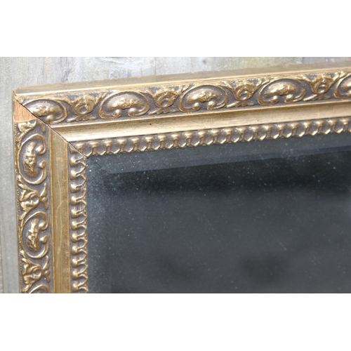 454 - 2 vintage ornate gilt framed hall mirrors, one approx 63cm x 94cm and the other approx 44cm x 128 cm