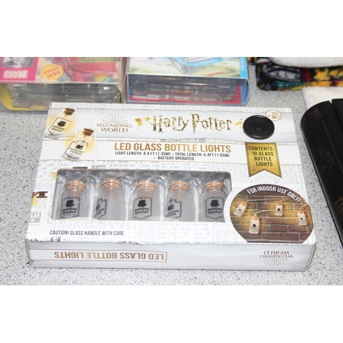 504 - Collection of Harry Potter/ JK Rowling items - 3 books, LED glass bottle lights, 2 sets of audio boo... 