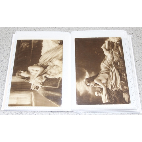 512 - 3 photo albums with antique and later postcards