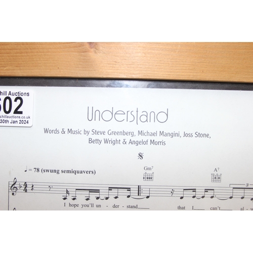 602 - Understand by Joss Stone, page of sheet music with facsimile signature of Joss Stone, approx 40cm x ... 